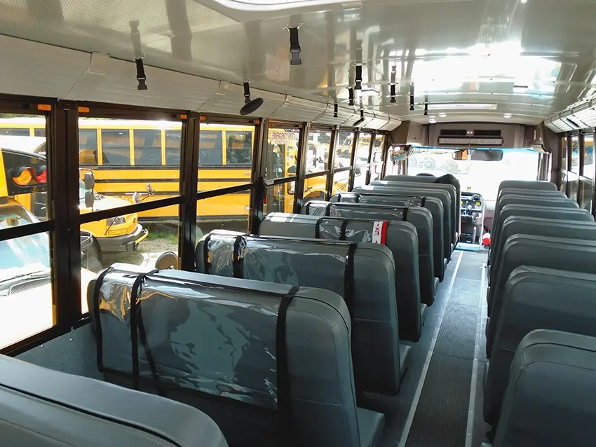 Soft Shield installed behind a school bus bench seat